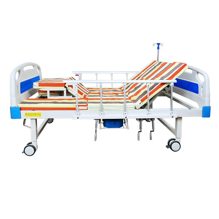 Venta en caliente Manual de cama de la cama de la cama del hospital multifuncional girando las camas de enfermería del hospital con inodoro automático